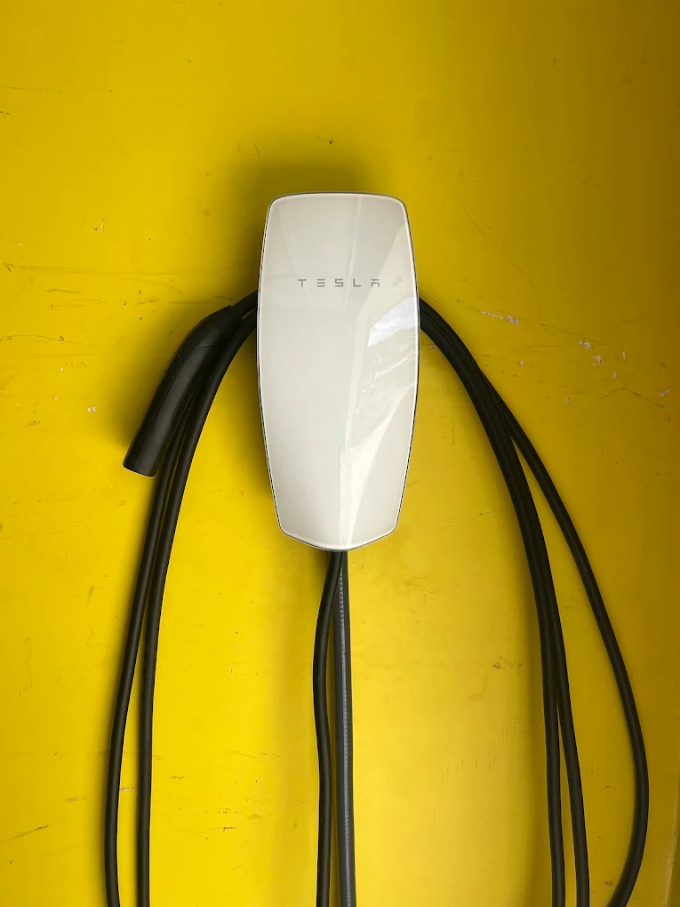 Tesla Wall Connector EV charger installed by County Electrical & Mechanical