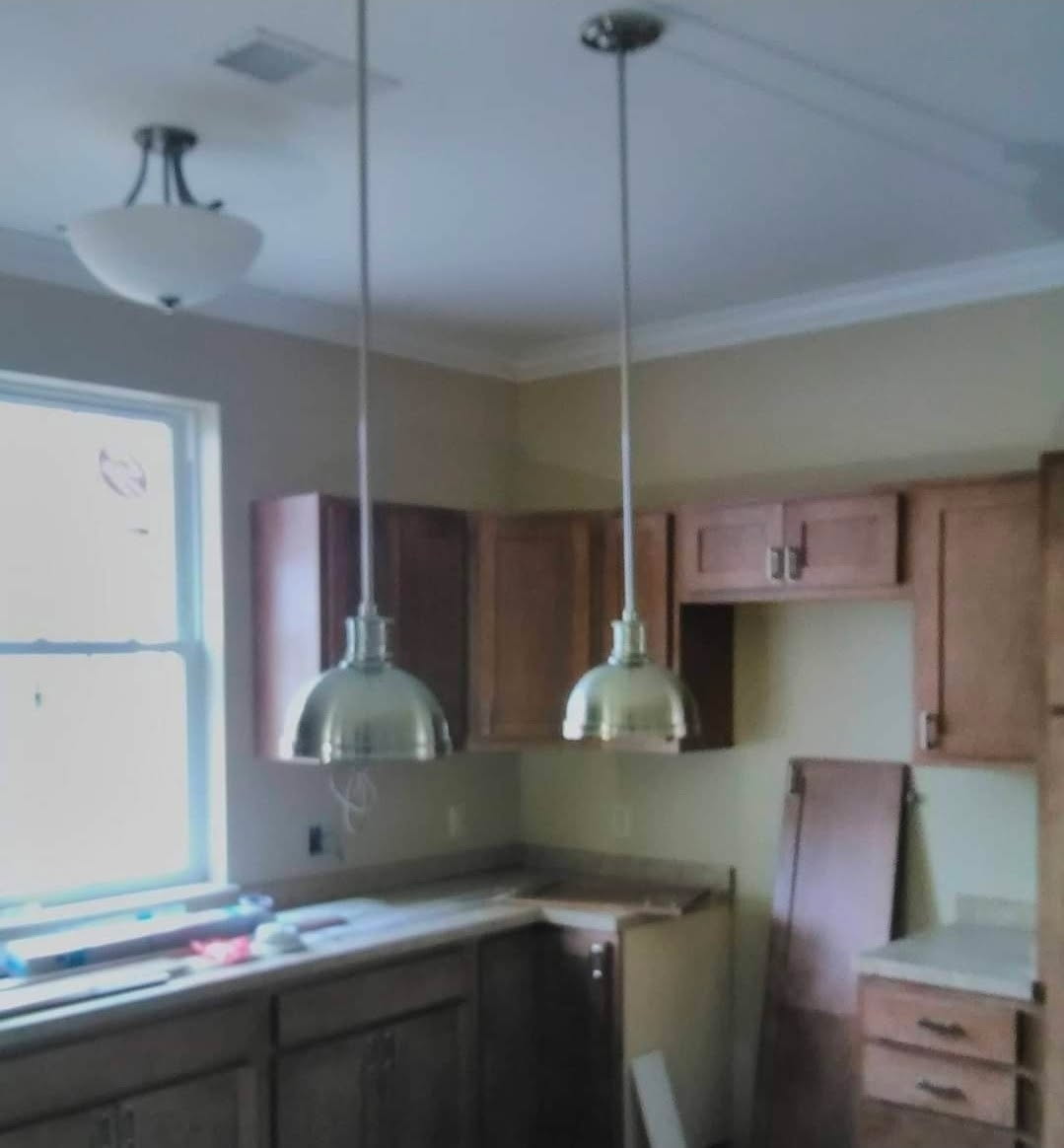 Pendant lights installed over a kitchen island