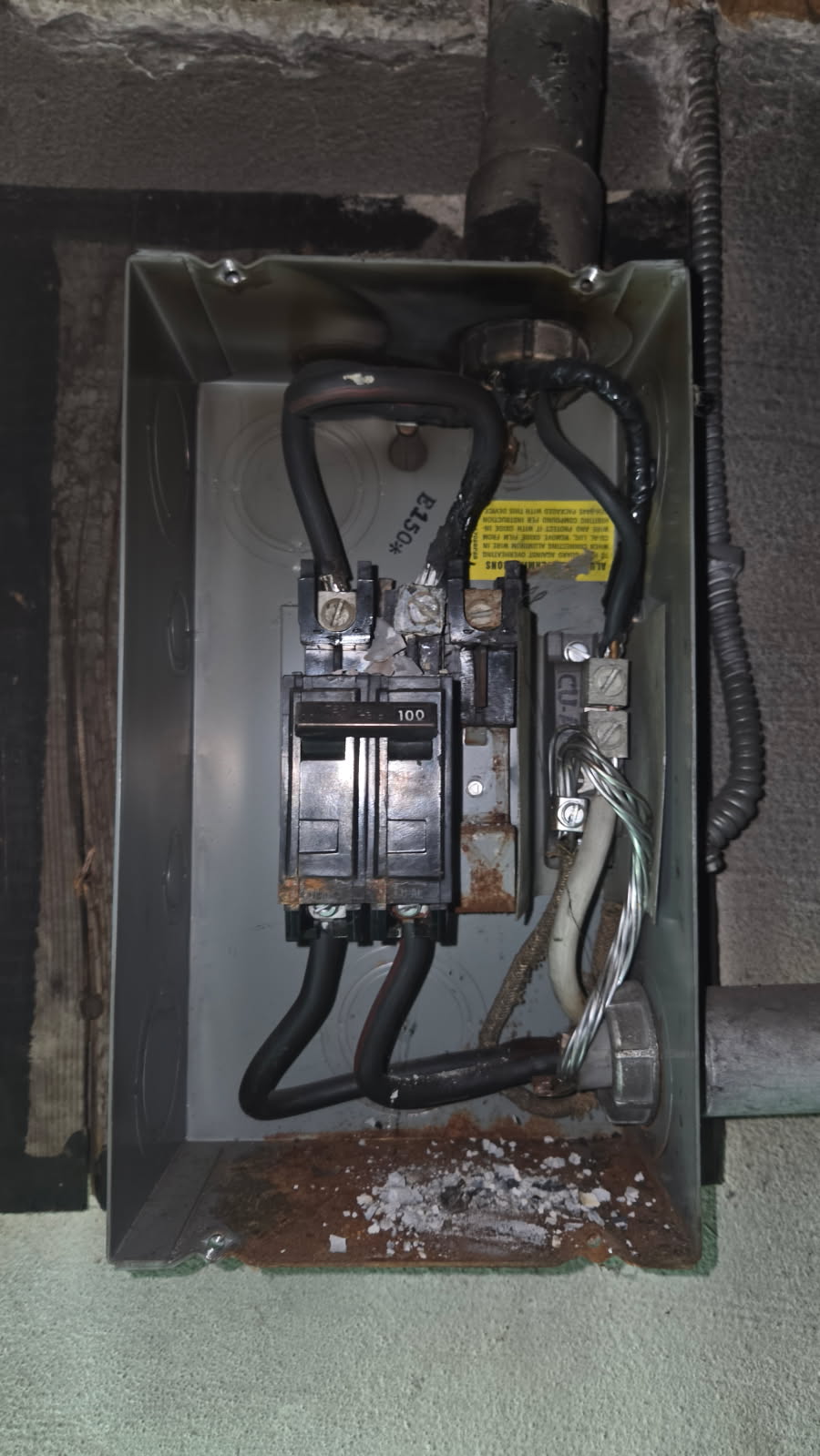 Damaged 100 amp main disconnect being replaced